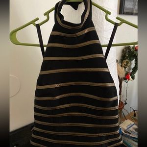 Size 4 ladies black & bronze ribbed cocktail top. Hook closure at neck, zip up .